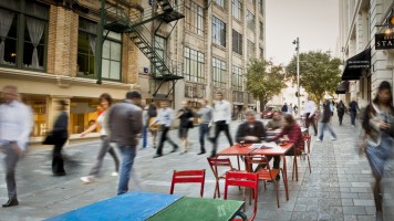 Auckland City Street - blurred images of people sitting outside on a pedestrian friendly city lane